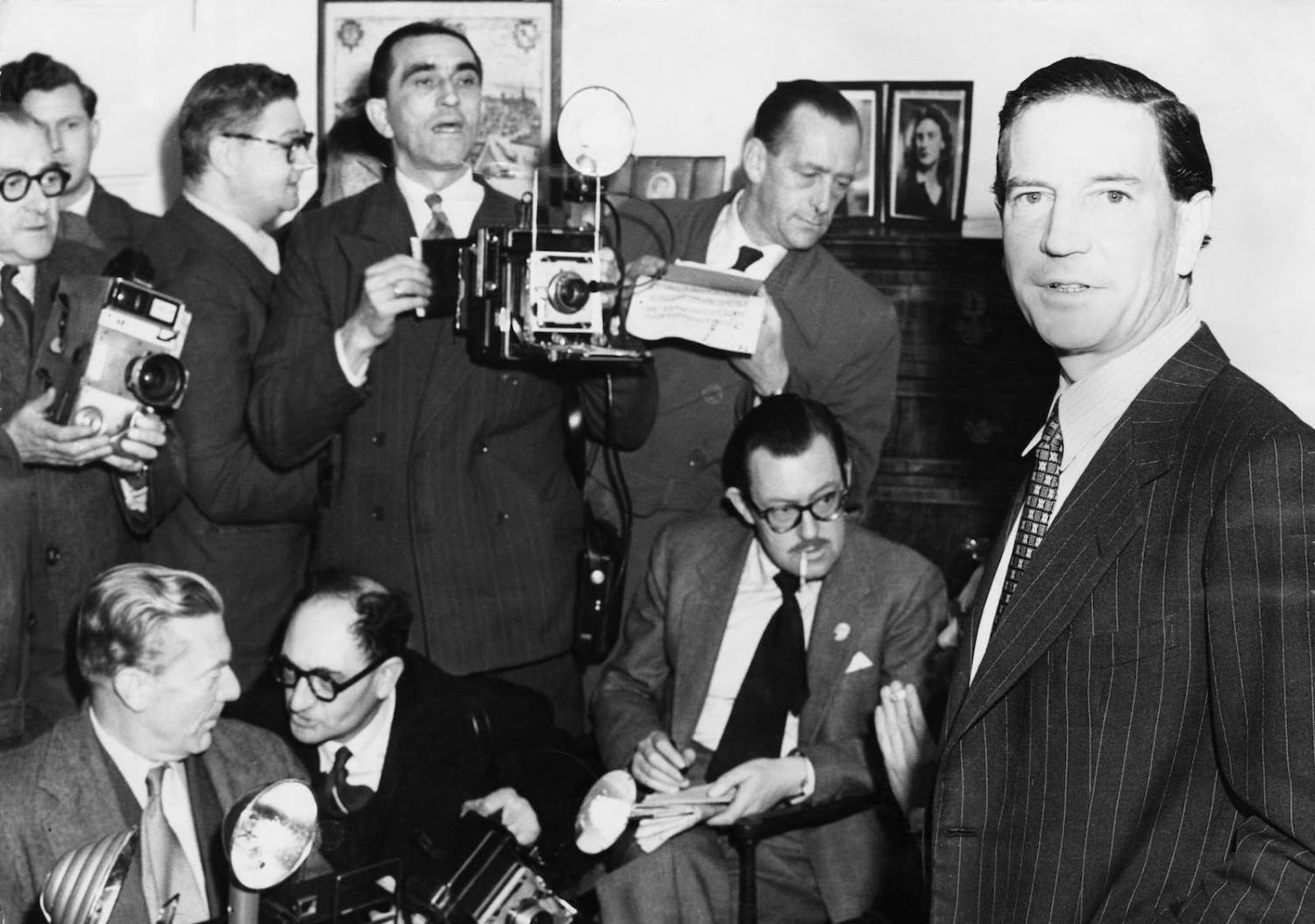Kim Philby, later revealed as one of the Cambridge Five spy ring, holds a press conference at his mother’s home in 1955 after his name had been mentioned in connection with the the Burgess and Maclean affair (Photo: Hulton Archive/Getty)