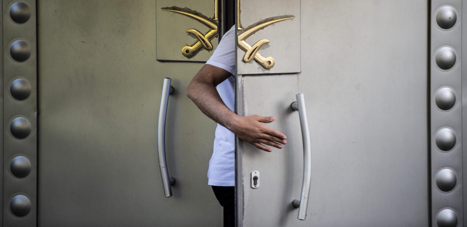 A Saudi official enters the door of the Saudi consulate in Istanbul, the last known location of journalist Jamal Khashoggi (Photo: Yasin Akgul via Getty)