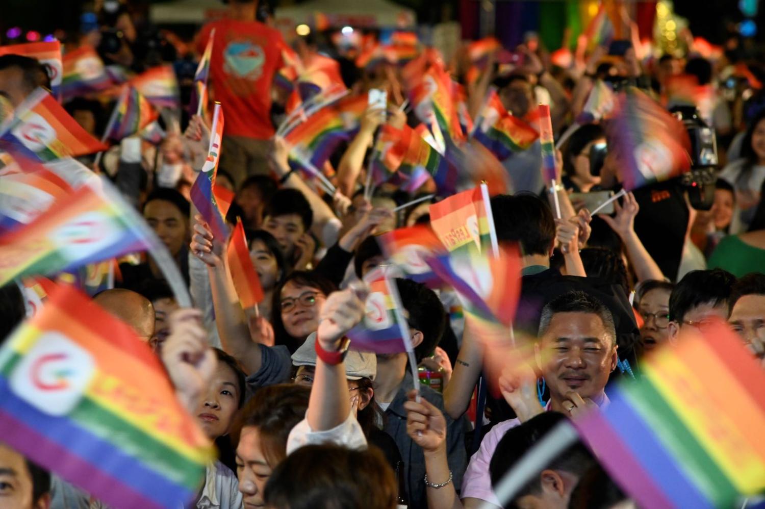 Rainbow flags during a mass wedding banquet for gay couples in front of the Presidential Palace in Taipei on 25 May (Photo: Sam Yeh via Getty)