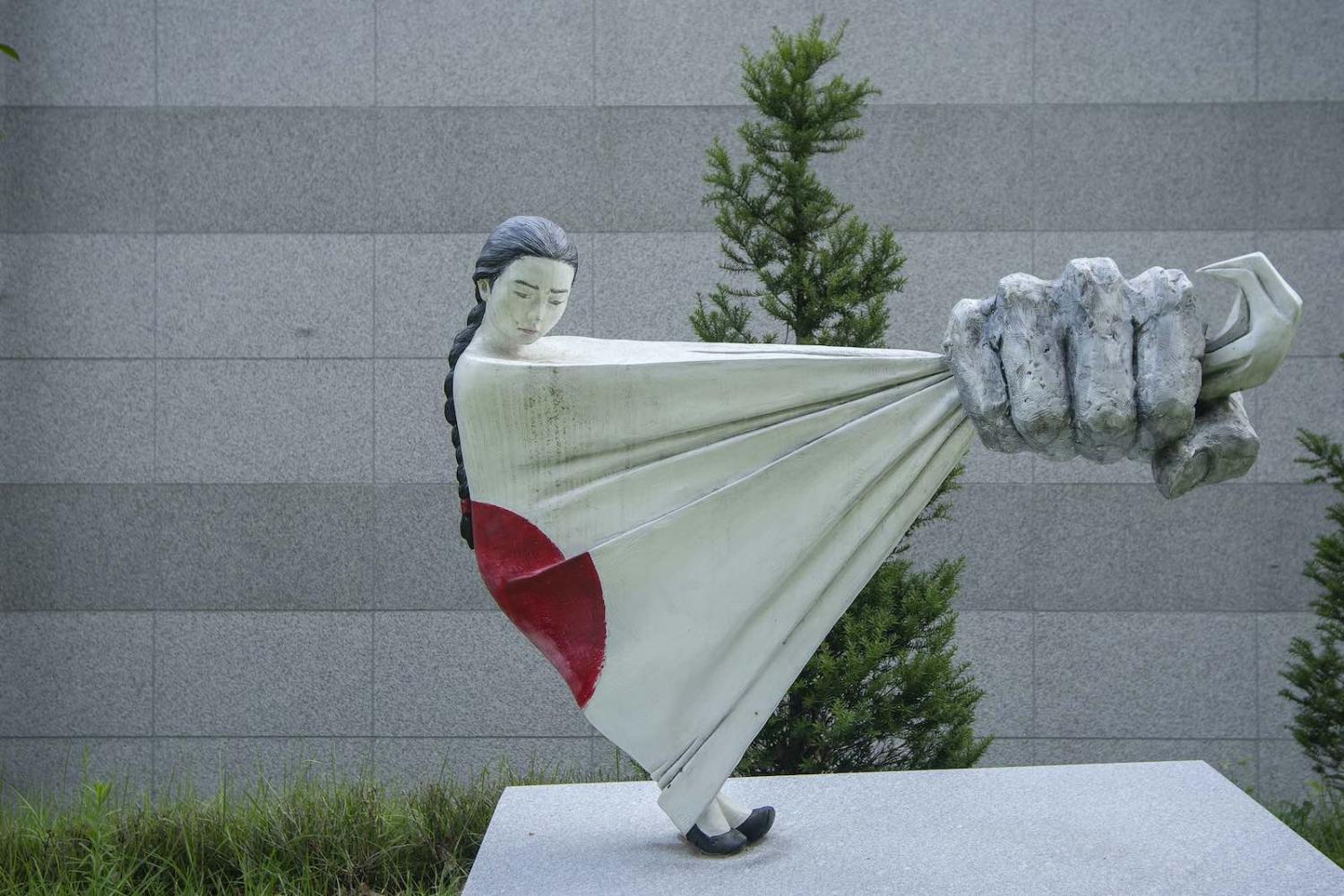 A sculpture to memorialise the “comfort women” of the Second World War at Memorial Park of Sharing House in Gwangju, South Korea (Seung-il Ryu/NurPhoto via Getty Images)
