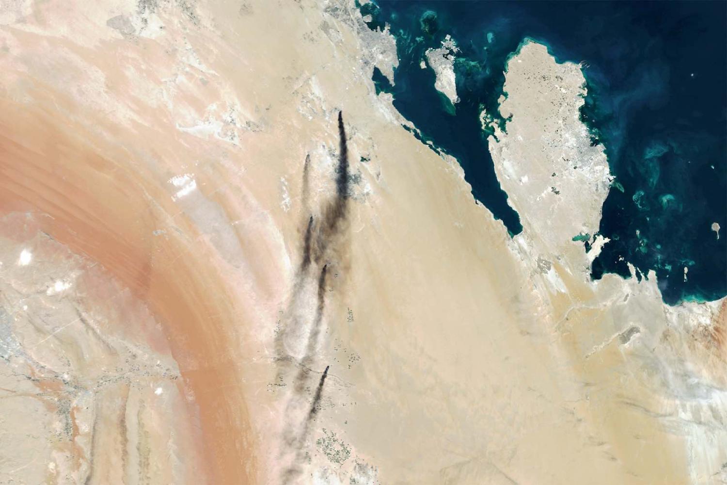Smoke billows from Saudi Aramco's oil processing plants in Abqaiq and Khurais, Saudi Arabia. (Photo by Orbital Horizon via Getty Images)