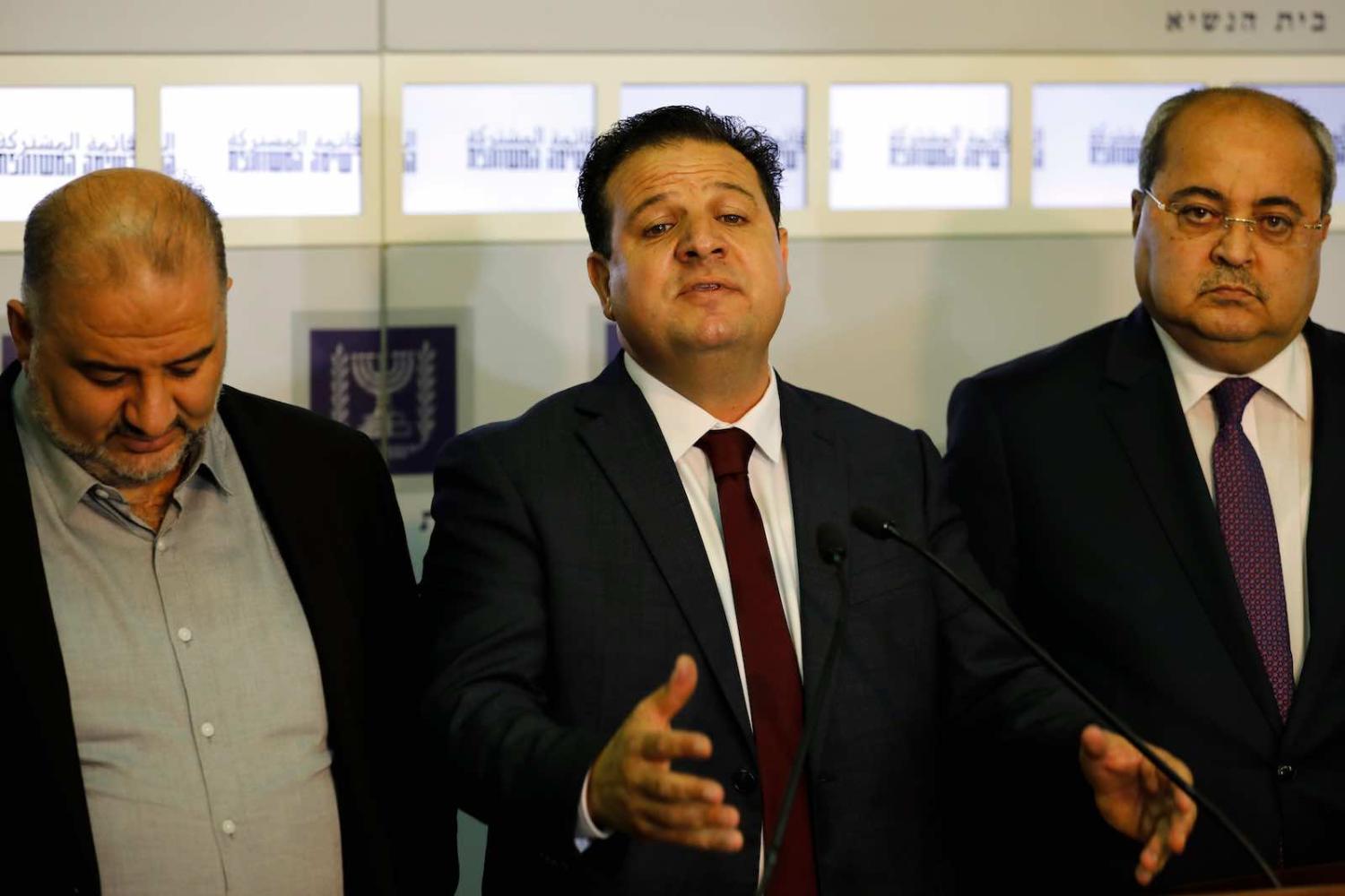 Ayman Odeh (centre) with members of the Joint Arab List (Photo: Menahem Kahana/AFP/Getty Images)
