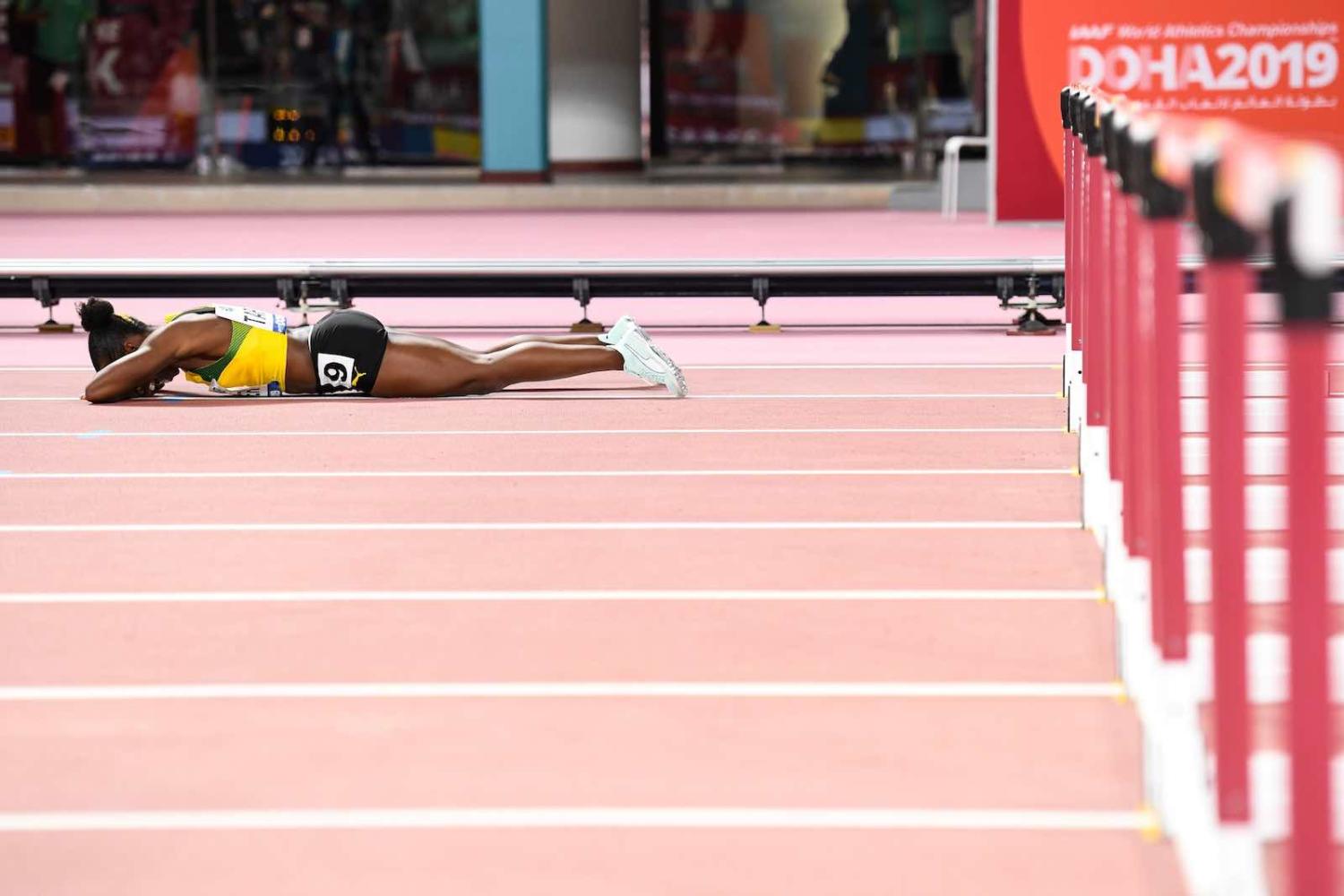Jamaica's Megan Tapper following the women’s 100-metre hurdles final in Doha on 6 October 2019 (Photo by Kirill Kudryavtsev/AFP/Getty Images)