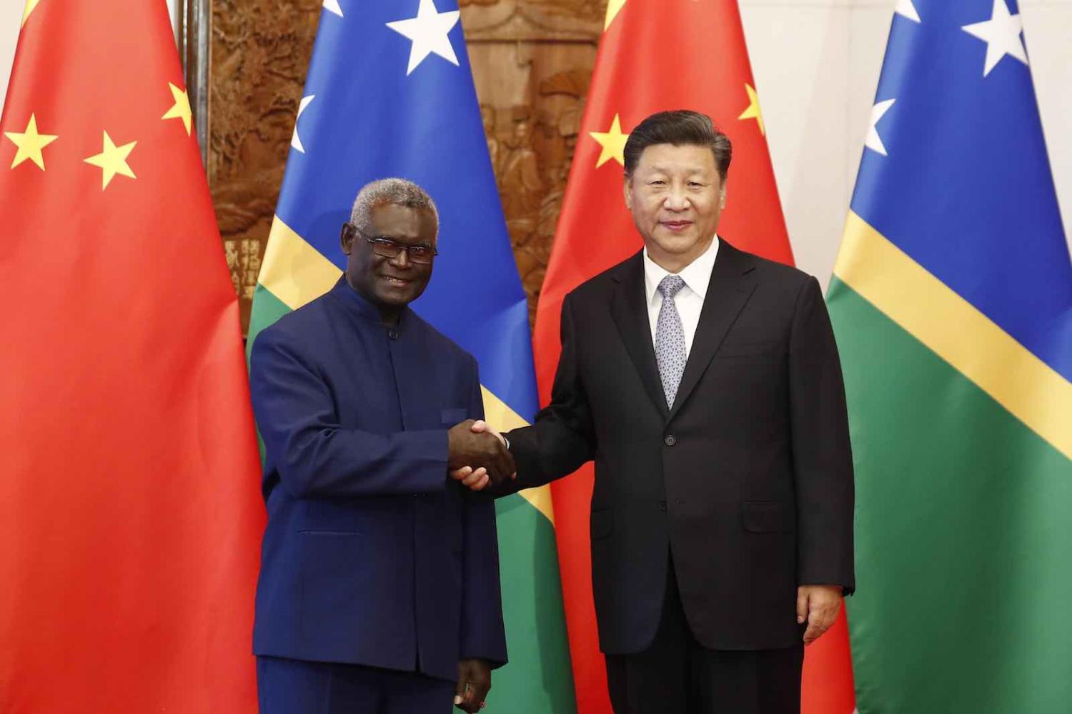 Solomon Islands’ Prime Minister Manasseh Sogavare and China’s Xi Jinping on 8 October in Beijing (Photo: Sheng Jiapeng/VCG/Getty Images)