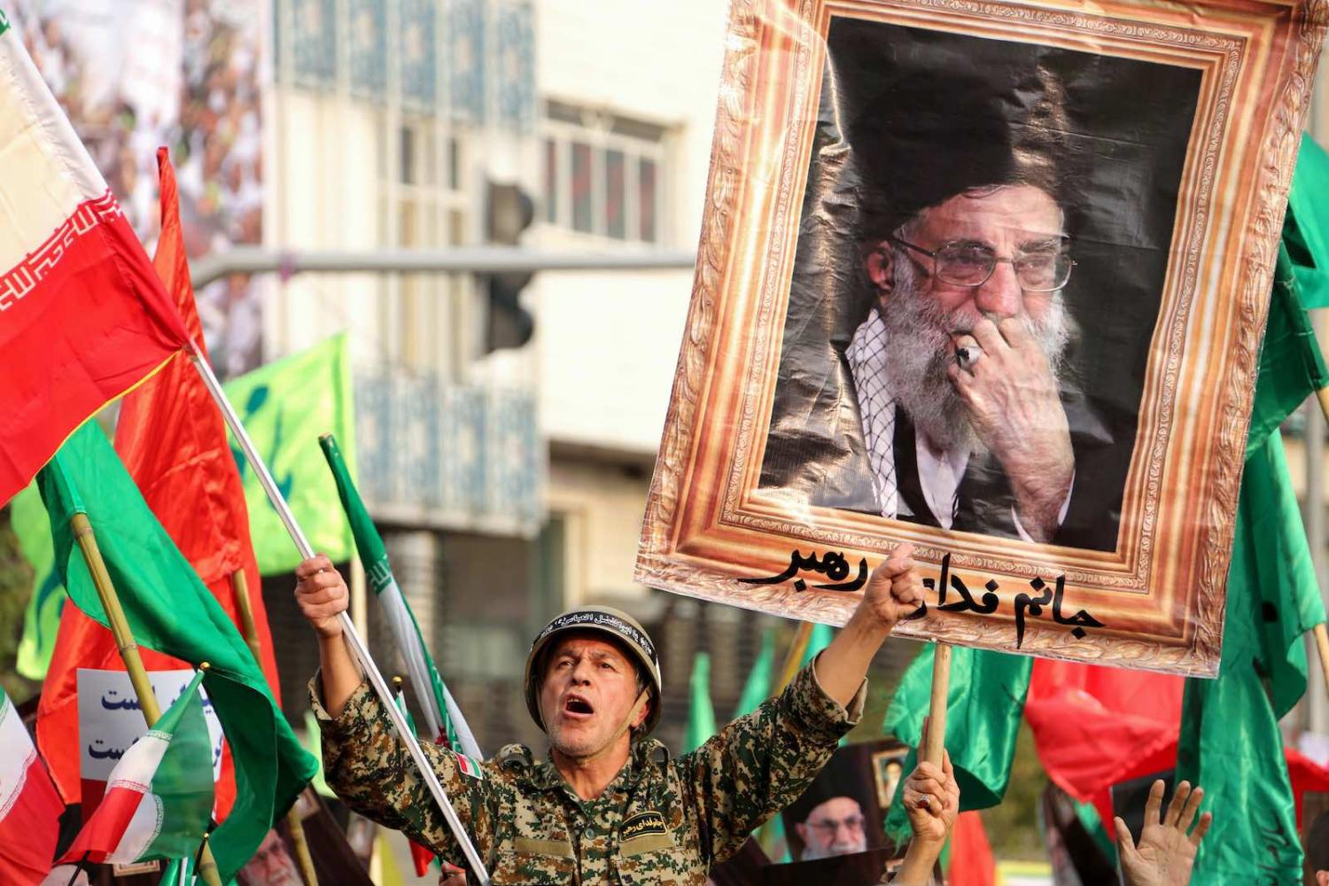 Iranian pro-government demonstrators on the streets in Tehran last month (Photo: Atta Kenare/AFP/Getty Images)