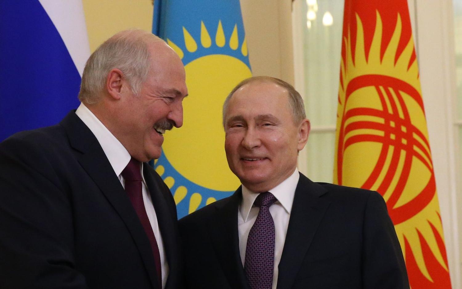 Belarusian President Alexander Lukashenko (left) with Russian President Vladimir Putin, Saint Petersburg, Russia, 20 December 2019. (Mikhail Svetlov/Getty Images)