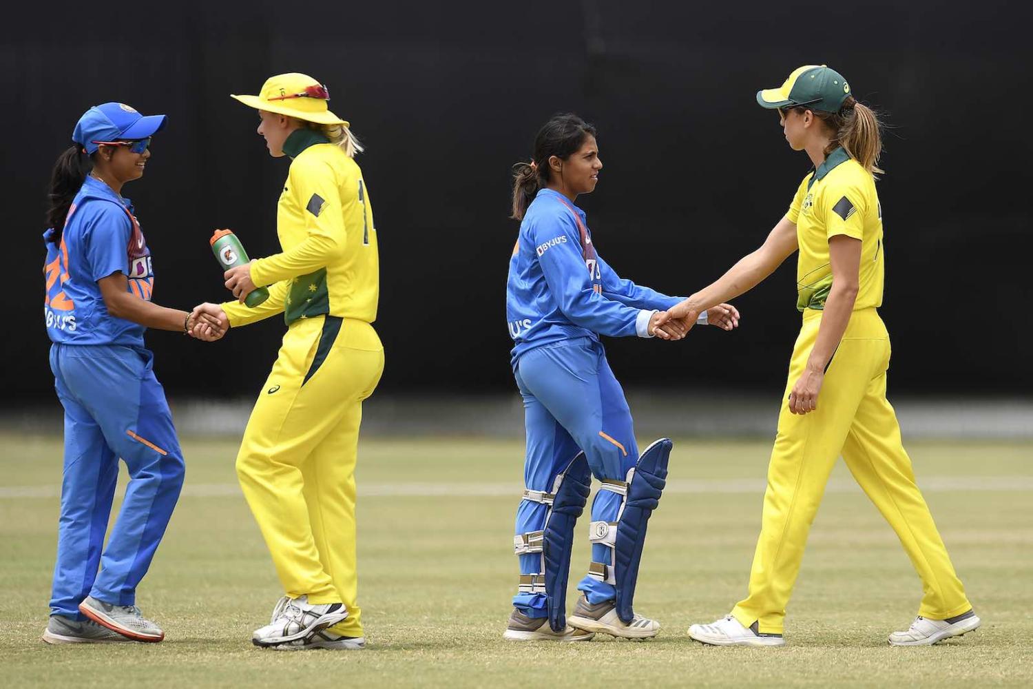 Players shake hands after a Women's T20 match between Australia A and India A last month on the Gold Coast, Australia (Photo: Albert Perez/Getty Images)