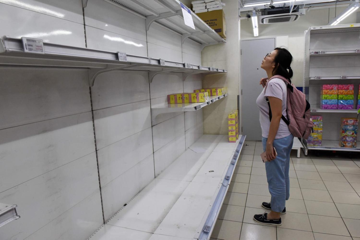 Empty shelves at a Singapore supermarket as the Covid pandemic spread in March 2020 (Catherine Lai/AFP via Getty Images)