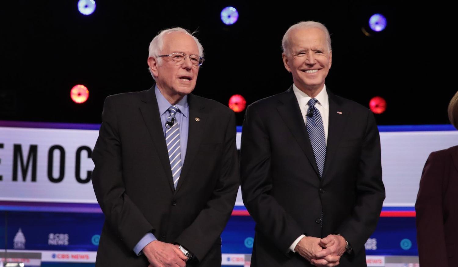 Democratic presidential candidates Bernie Sanders (l) and Joe Biden before a debate in Charleston, South Carolina, 25 February (Scott Olson/Getty Images)