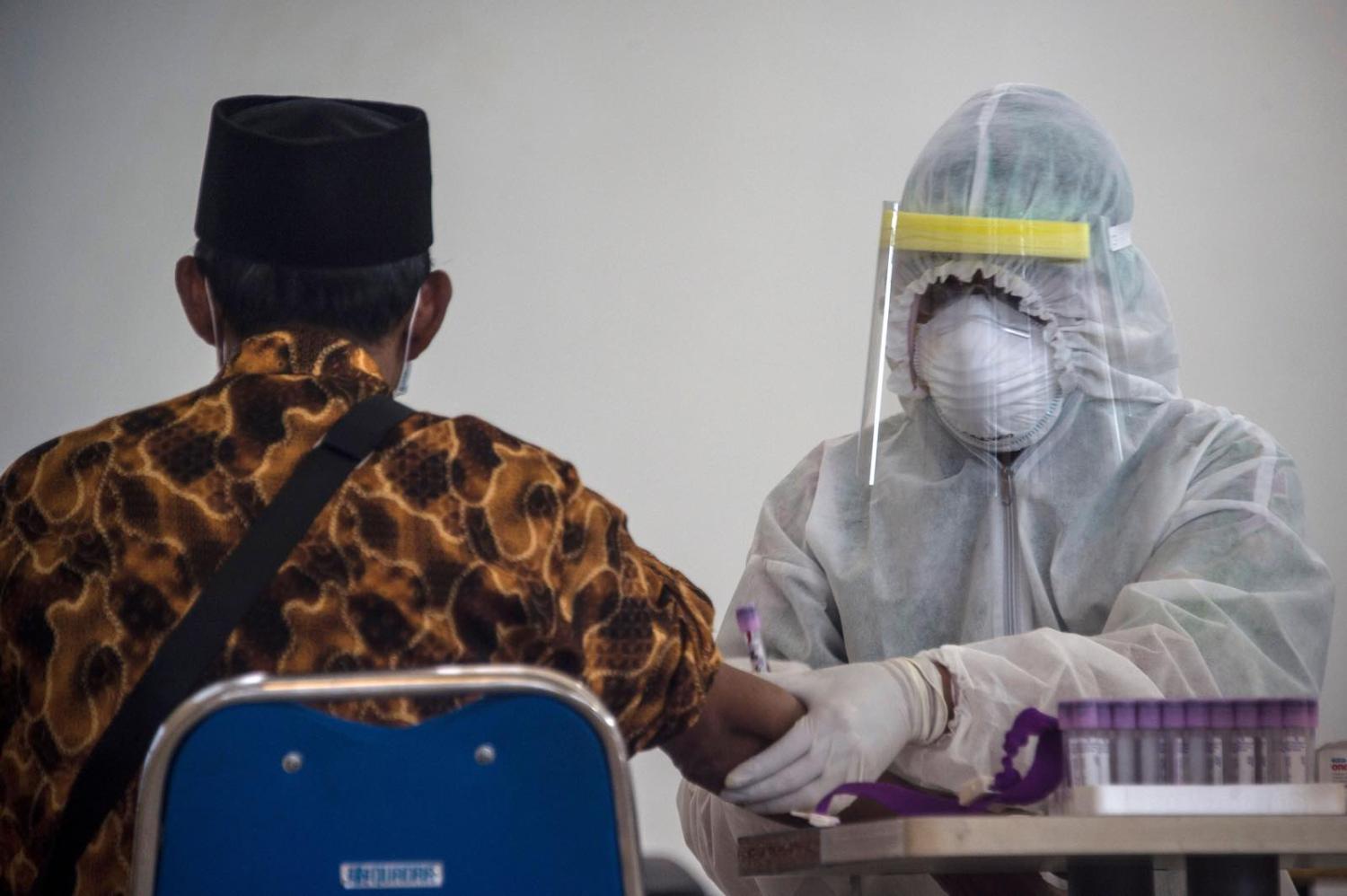 Health screening at Surabaya airport in Indonesia’s East Java Juni Kriswanto/AFP/Getty Images)
