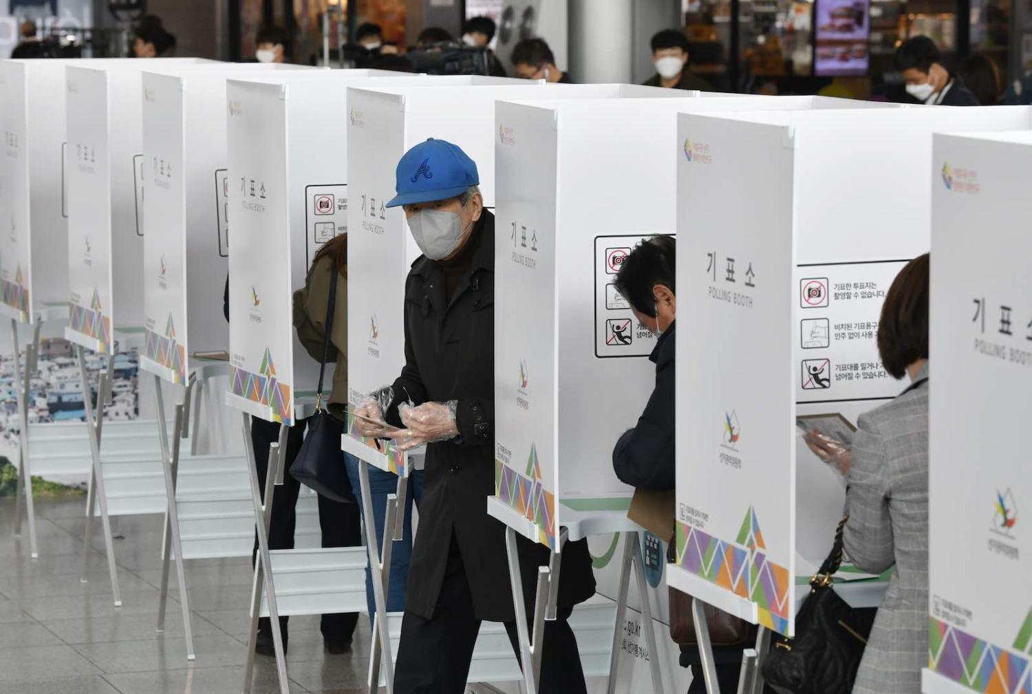 Early voting at a polling station in Seoul on 10 April ahead of next week's parliamentary elections (Jung Yeon-je/AFP/Getty Images)