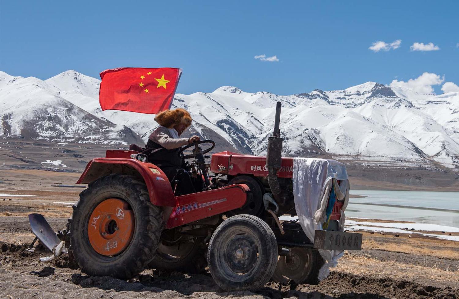 A farmer takes part in a ceremony marking the start of spring ploughing at Beicun Village in Ombu Township of Nyima County, Nagqu City, southwest China’s Tibet Autonomous Region, April 2020 (Hou Jie/Xinhua via Getty Images)