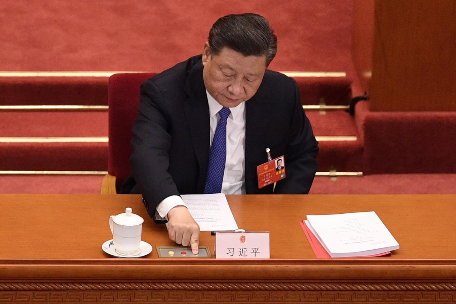 China’s Xi Jinping votes on the security law for Hong Kong during the National People's Congress in Beijing in May (Nicolas Asfouri/AFP/Getty Images)