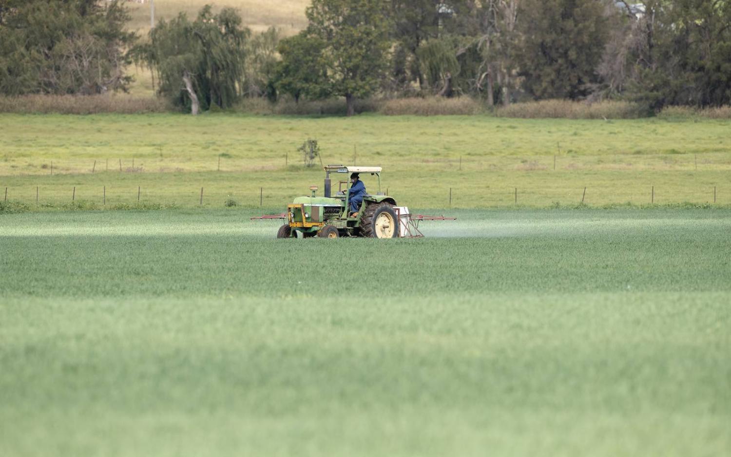 A farmer sprays his crop in Dungowan, north-west New South Wales, Australia, May 2020 (Mark Kolbe/Getty Images)