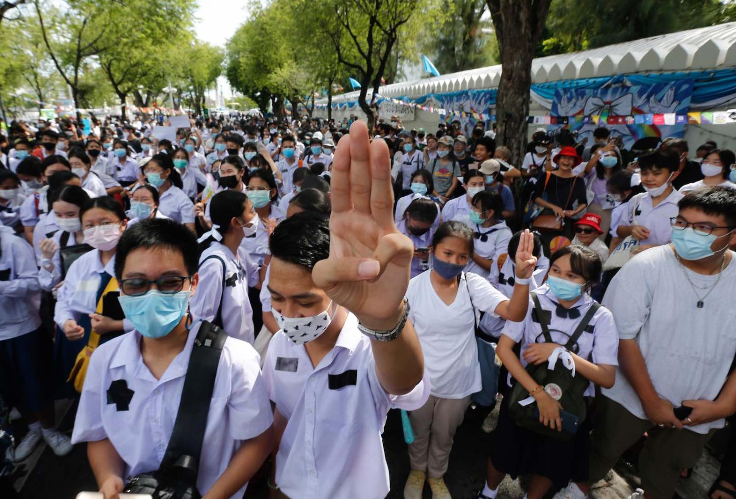 A Thai student gives a three-finger salute during a rally outside the Ministry of Education, Bangkok, 5 September 2020 (Chaiwat Subprasom/SOPA Images/LightRocket via Getty Images)
