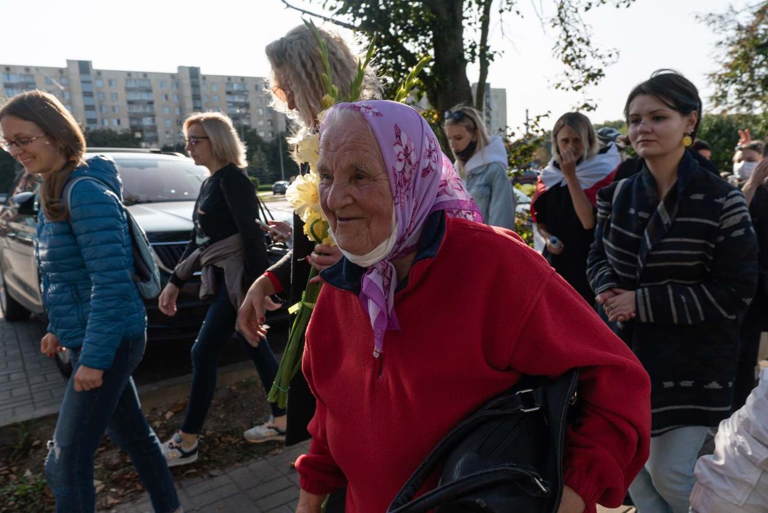 A elderly woman marches in a protest against the continued rule of president Alexander Lukashenko, 19 September 2020 in Minsk, Belarus (Jonny Pickup/Getty Images)