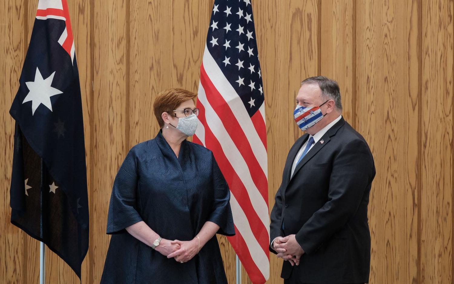 Foreign Minister Marise Payne (L) speaks with US Secretary of State Mike Pompeo during a Quad Indo-Pacific meeting in Tokyo, 6 October 2020 (Nicolas Datiche/Pool/AFP via Getty Images)