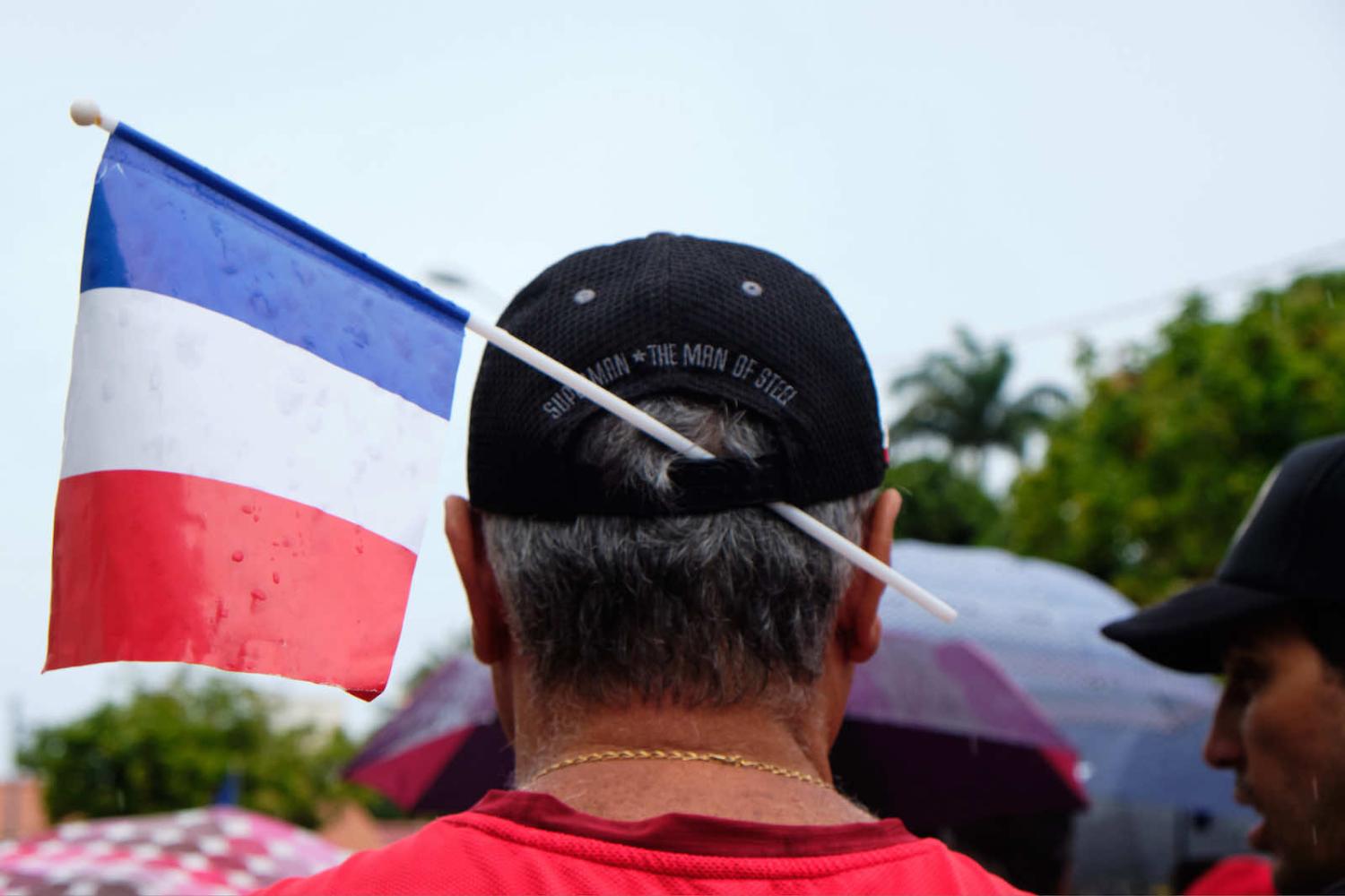 A man wears a French flag in his cap during the “March for Freedom” demonstration called by pro-France parties in Noumea in December 2020 (Getty Images)