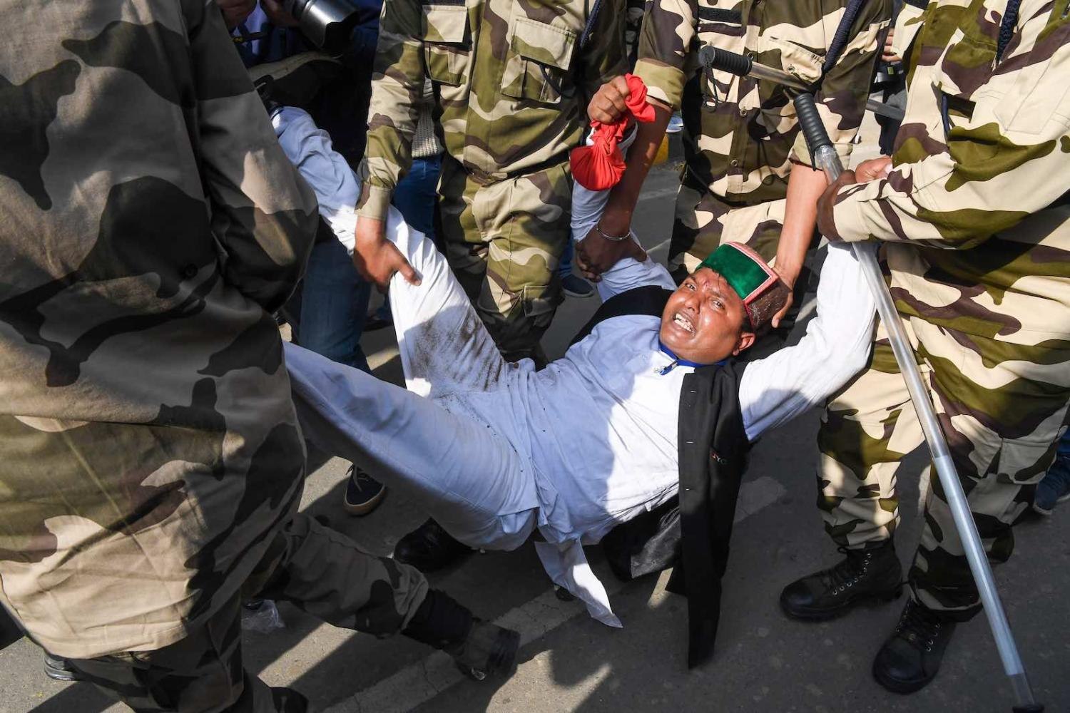 Police detained Indian Youth Congress workers during a protest against new agricultural laws, unemployment and rising prices, New Delhi, 9 February (Prakash Singh/AFP via Getty Images)