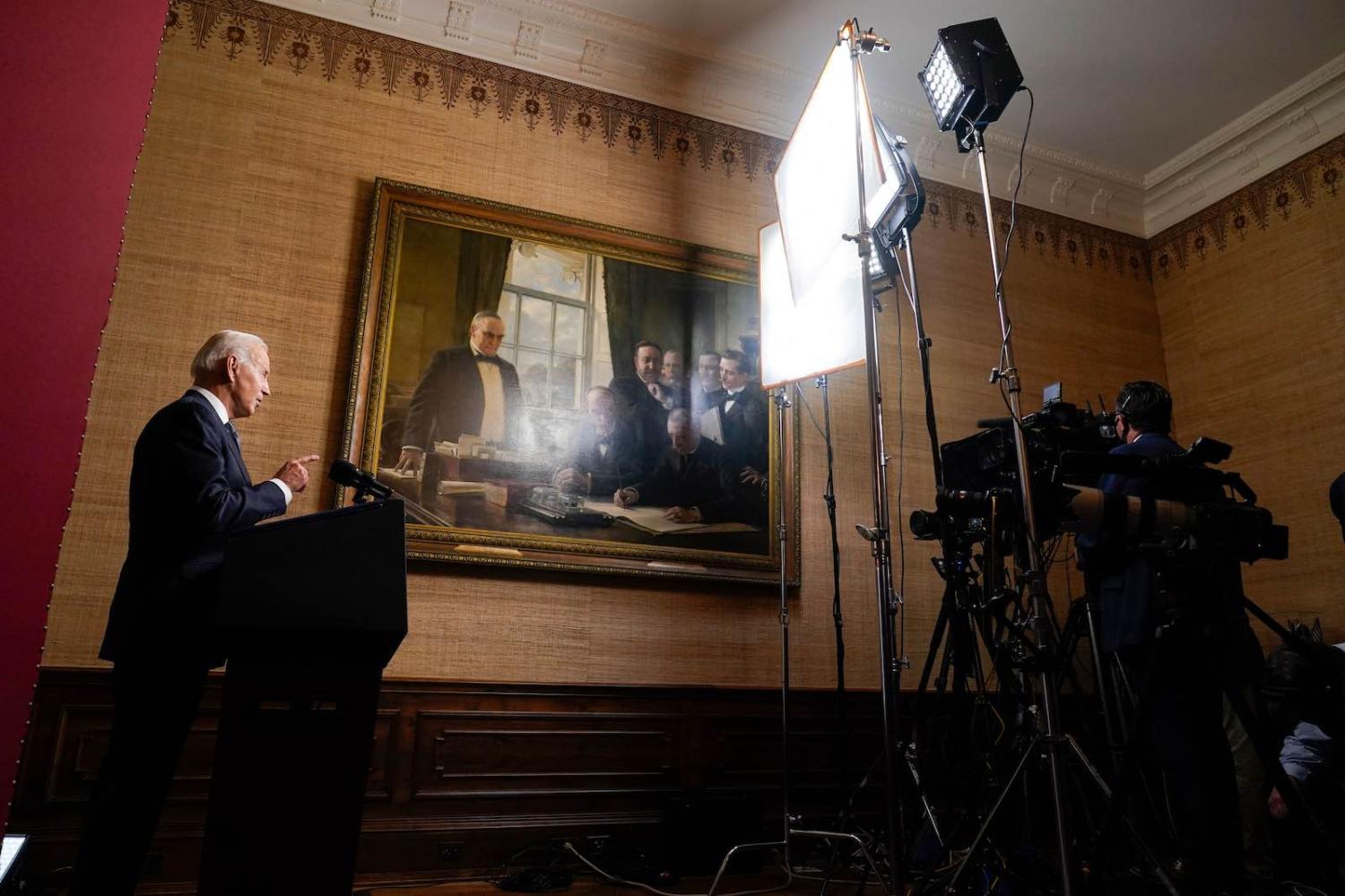 US President Joe Biden speaks in the White House about the withdrawal of US troops from Afghanistan, 14 April 2021 (Andrew Harnik/Pool/AFP via Getty Images)