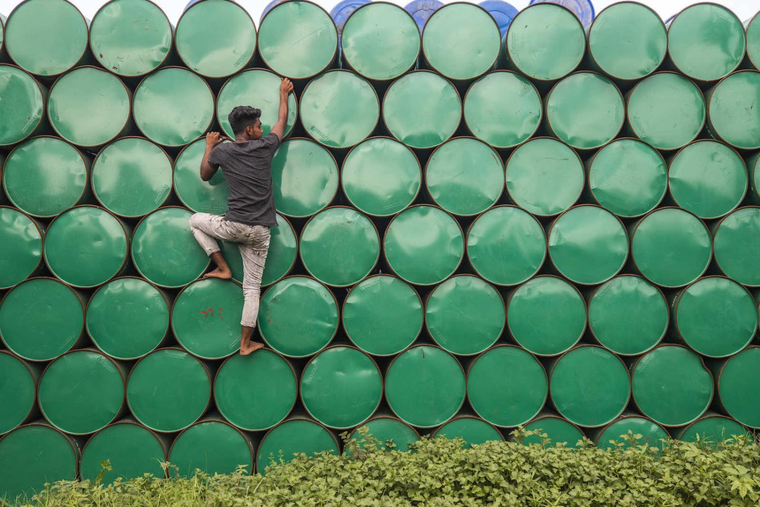 Empty oil drums at a warehouse in Narayanganj on 19 May (Ahmed Salahuddin/NurPhoto via Getty Images)