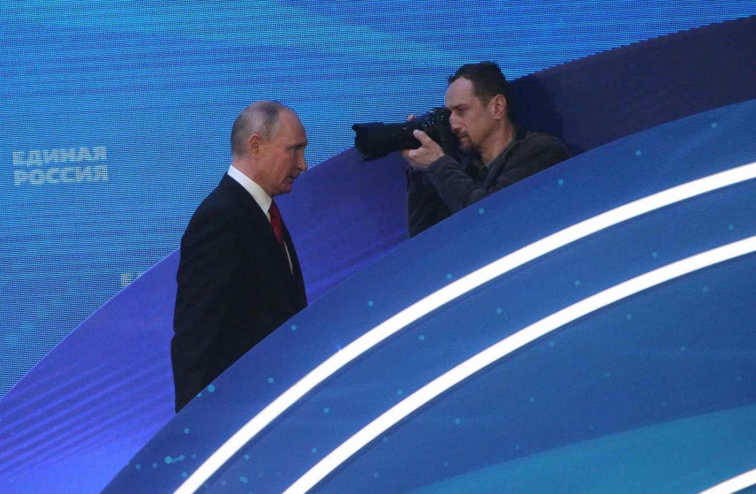 Russian President Vladimir Putin leaves after a speech at the 20th Congress of the United Russia Party in Moscow, 19 June 2021 (Mikhail Svetlov/Getty Images)