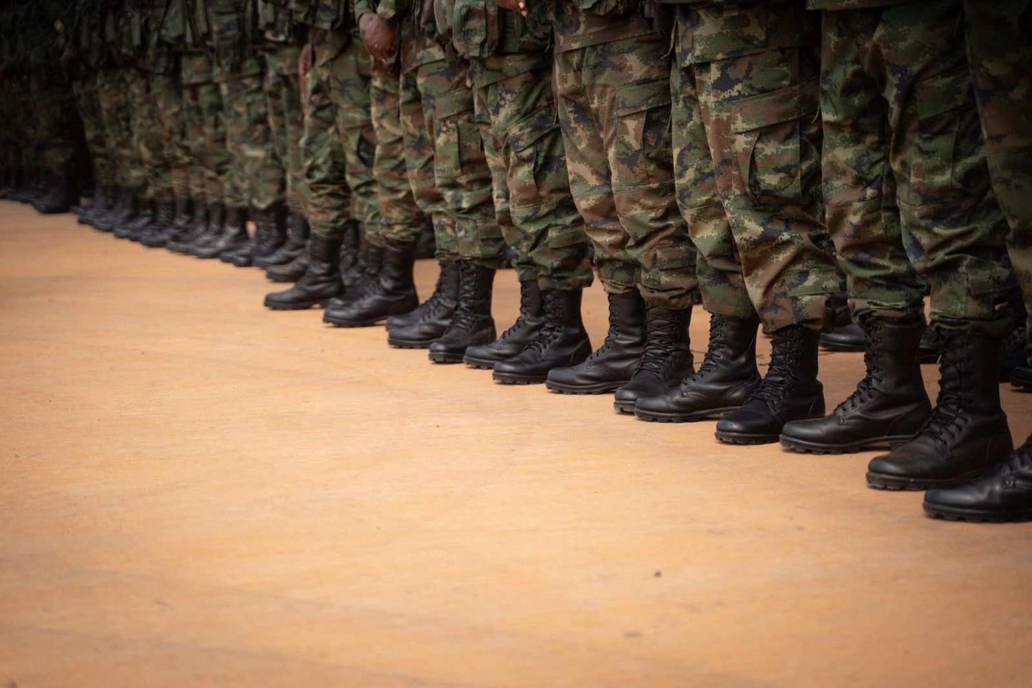 Rwandan soldiers and police prepare to deploy to Mozambique from Kigali airport on 10 July (Simon Wohlfahrt/AFP via Getty Images)