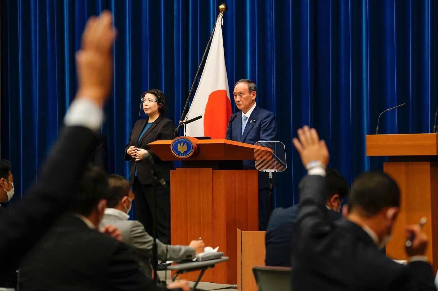Japan’s Prime Minister Yoshihide Suga during a news conference at his official residence in Tokyo on 17 August (Kimimasa Mayama/AFP via Getty Images)