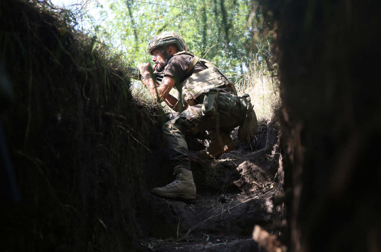 A Ukrainian marine keeps watch from a position of the frontline with Russia-backed separatists not far from the separatist stronghold of Donetsk in eastern Ukraine in September (Anatolii Stepanov/AFP via Getty Images)