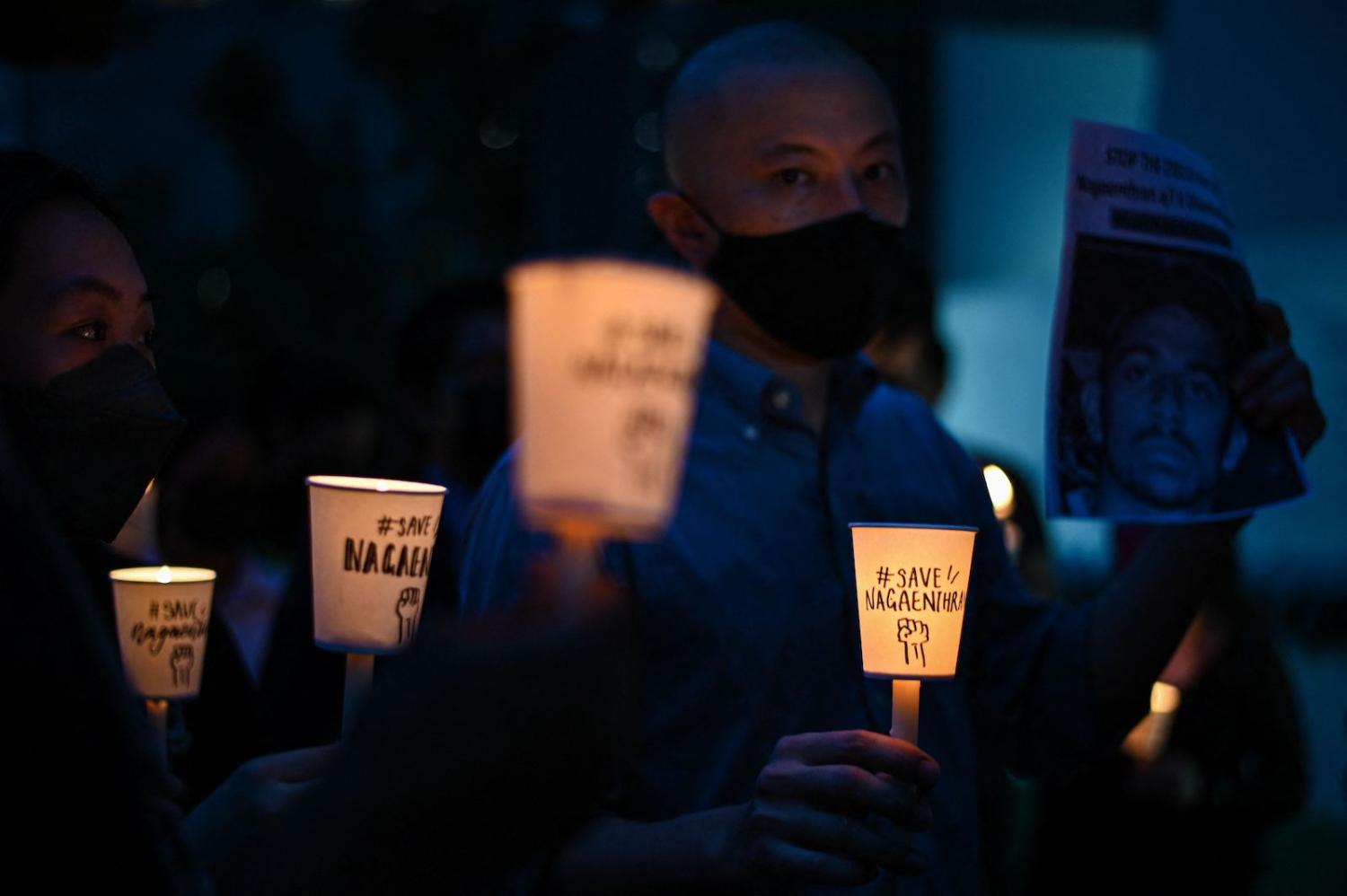 A candlelight vigil to protest the execution of Nagaenthran K. Dharmalingam in Singapore (Mohd Rasfan/AFP via Getty Images)