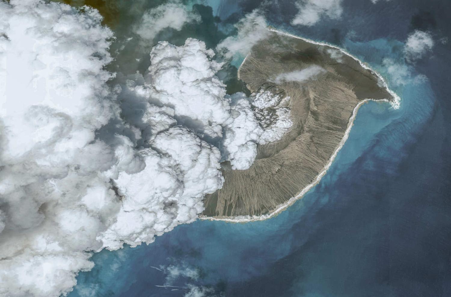 Smoke billows from the Hunga Tonga–Hunga Ha’apai volcano in the weeks before the 15 January eruption (Maxar via Getty Images)