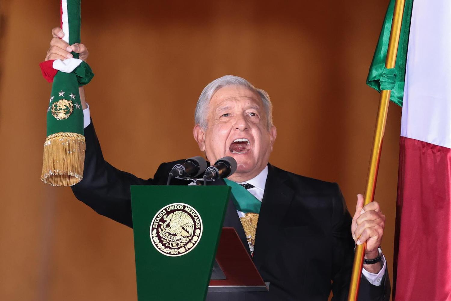 Mexican President Andrés Manuel López Obrador delivers the “Cry of Dolores” to kick off Independence Day celebrations at the National Palace in Mexico City, 15 September 2020 (Hector Vivas/Getty Images)