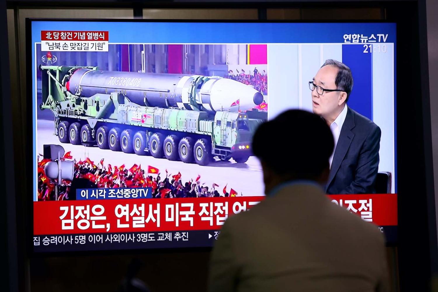 Footage of an 11 axle truck carrying what is said to be a monster-sized ICBM broadcast during North Korea’s ruling party’s 75th anniversary day military parade (Chung Sung-Jun/Getty Images)