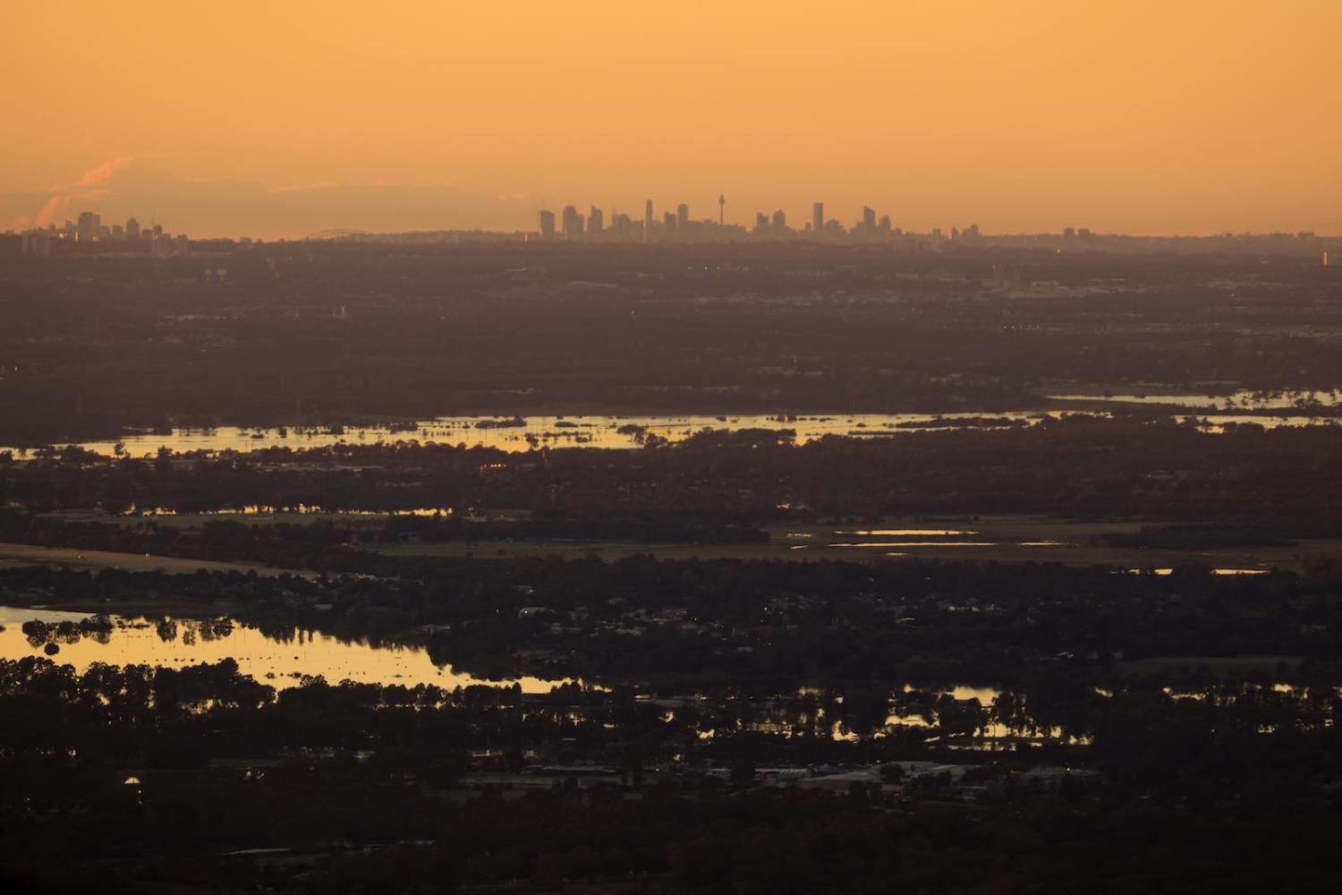 Floods in the Hawkesbury River region near Kurrajong Heights, with the Sydney skyline in the distance, 24 March 2021 (Mark Evans/Getty Images)