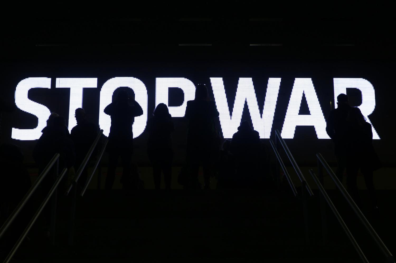 A protest message is displayed on a giant LED screen inside a football stadium in Madrid, Spain (Photo by Gonzalo Arroyo Moreno/Getty Images)