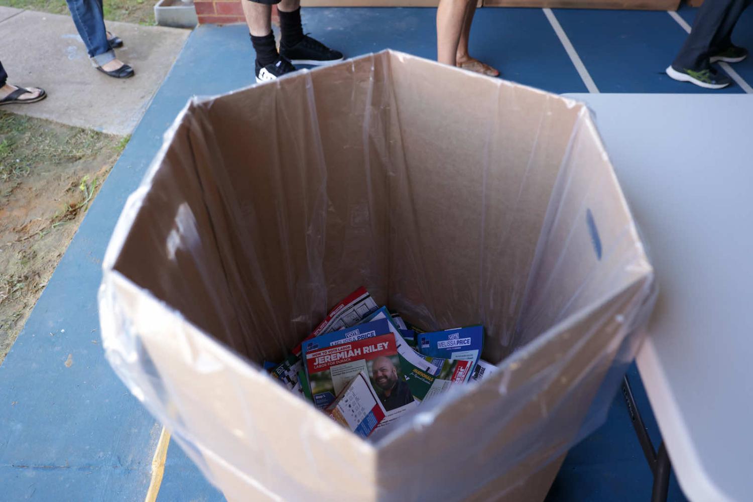 Discarded campaign leaflets after people have cast their votes at a polling centre  in Geraldton, Western Australia, during the 2022 federal election (Tamati Smith/Getty Images)