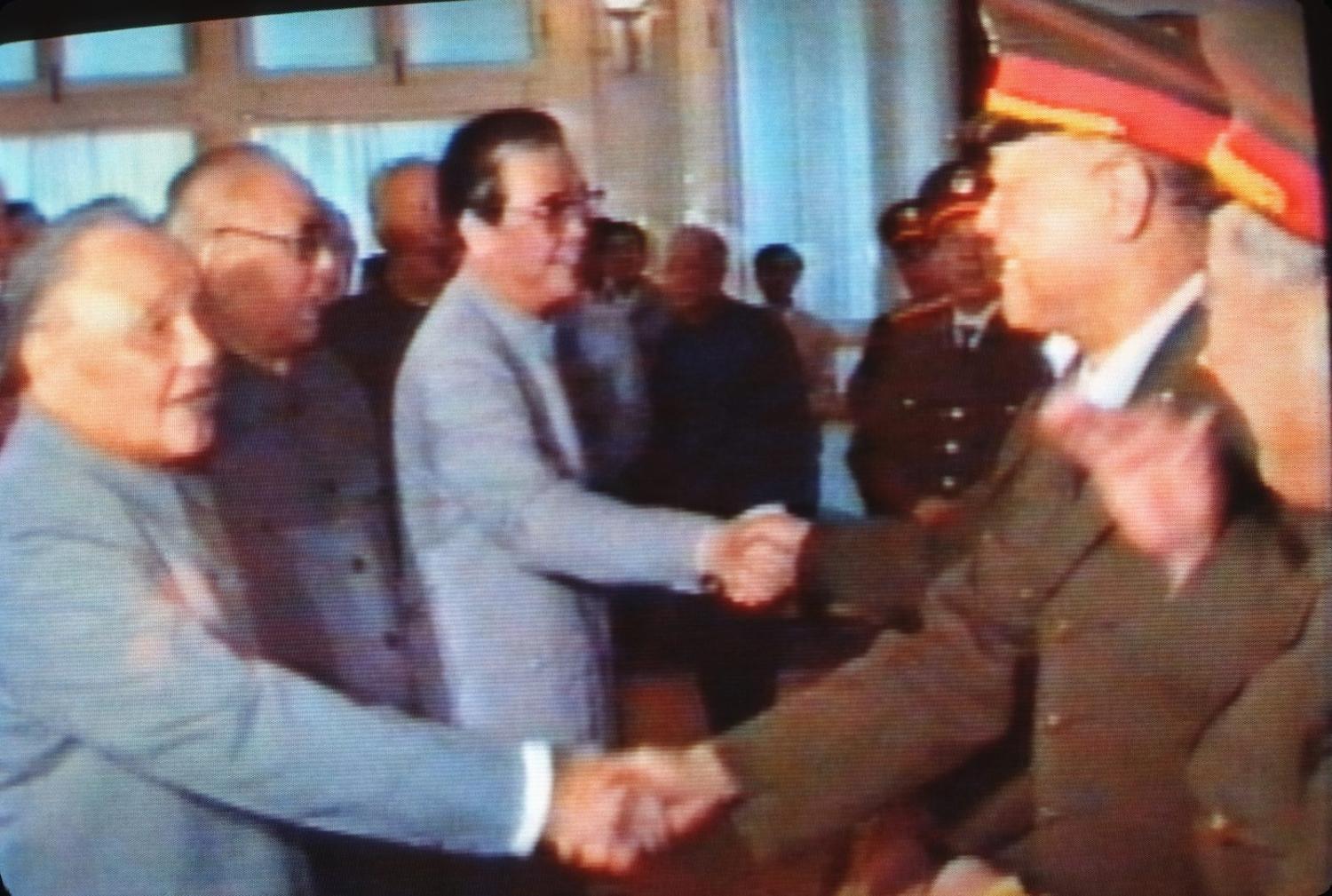 Broadcast from Chinese State Television in 1989 showing Deng Xiaoping congratulating soldiers for putting an end to the demonstrations in Tiananmen Square (Photo: Peter Charlesworth via Getty)