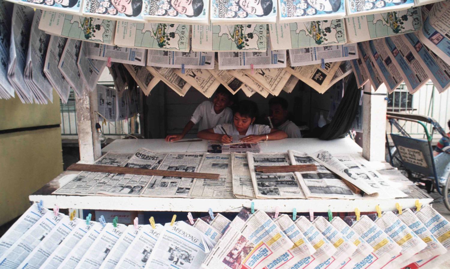 A fully stocked newspaper kiosk in 1990s Phnom Penh (Photo: Yvan Cohen via Getty Images)
