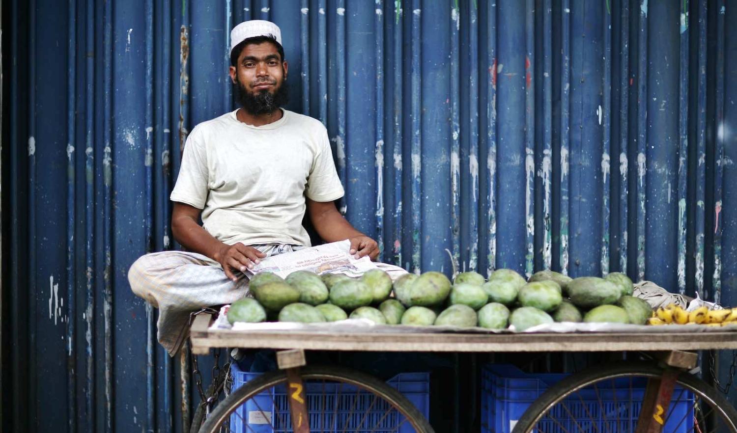 A mango seller in Chittagong, Bangladesh (Nayeem Kalam via Getty Images)
