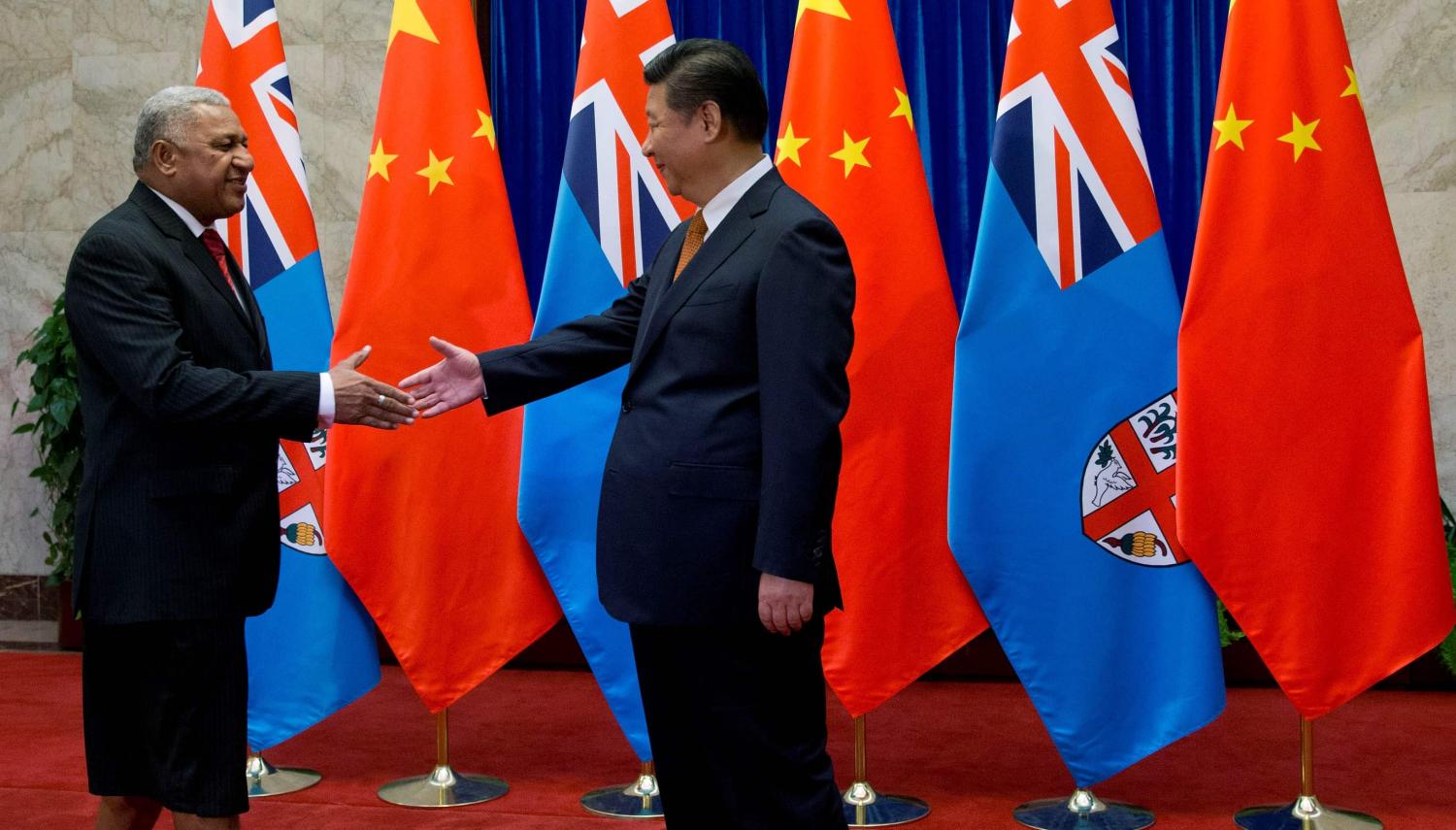 Fijian Prime Minister Frank Bainimarama and Chinese President Xi Jinping, July 2015 (Photo: Andy Wong/Getty Images)