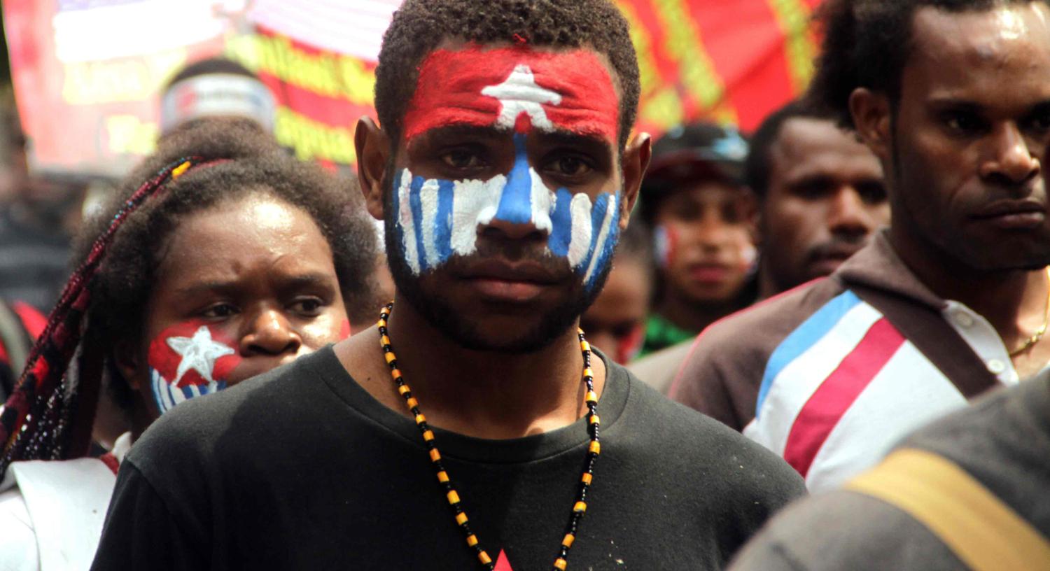 Students from the West Papua, Papua Student Alliance (AMP) demonstrate in Yogyakarta, Indonesia in 2014 (Photo: Slamet Riyadi/Getty)