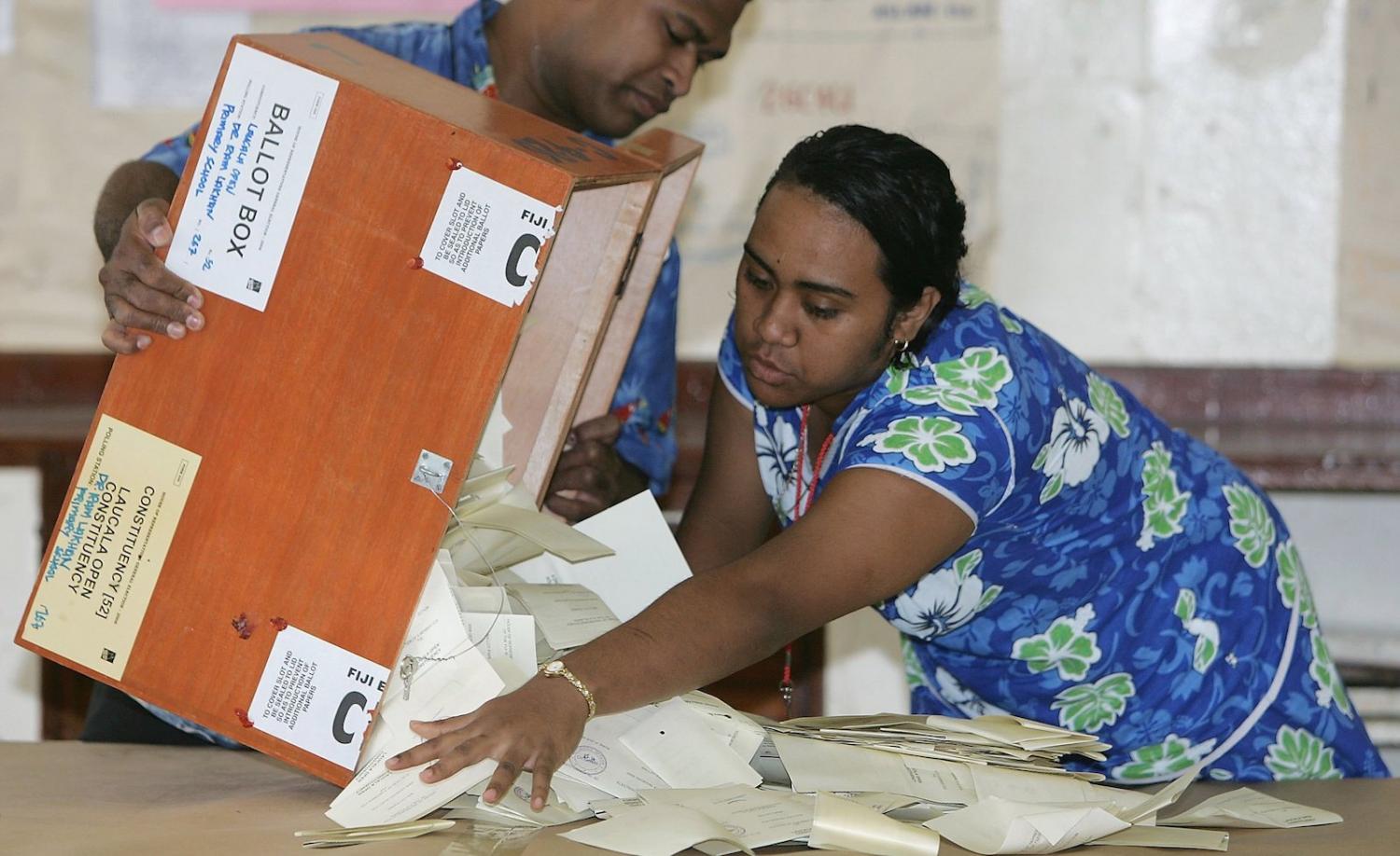 Workers empty a ballot box in Suva, Fiji in 2006 (Photo: Sandra Mu via Getty)