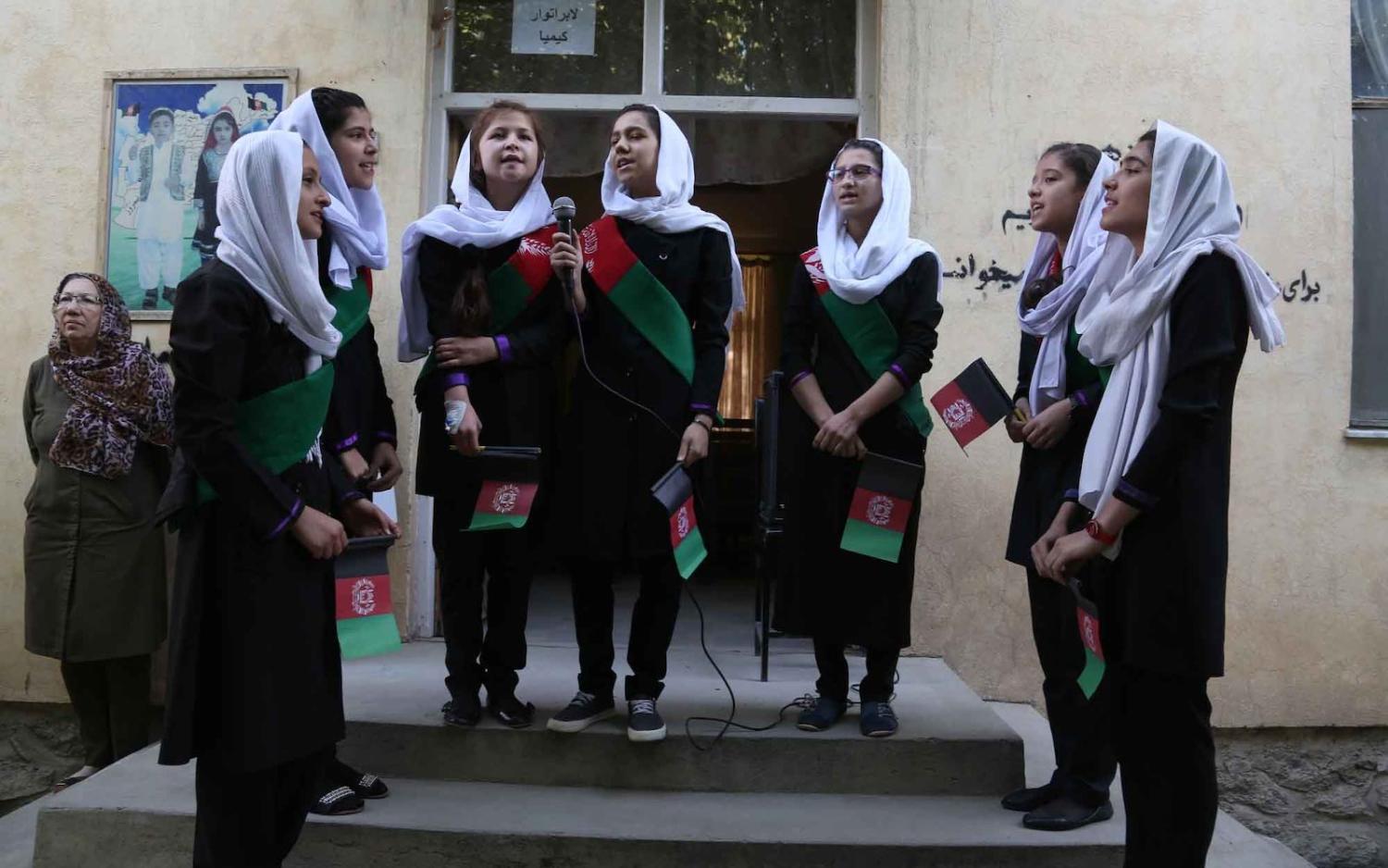 Afghan girl students sing the national anthem before classes at Surya High School in Kabul, September 2016 (Xinhua/Rahmat Alizadah via Getty Images)
