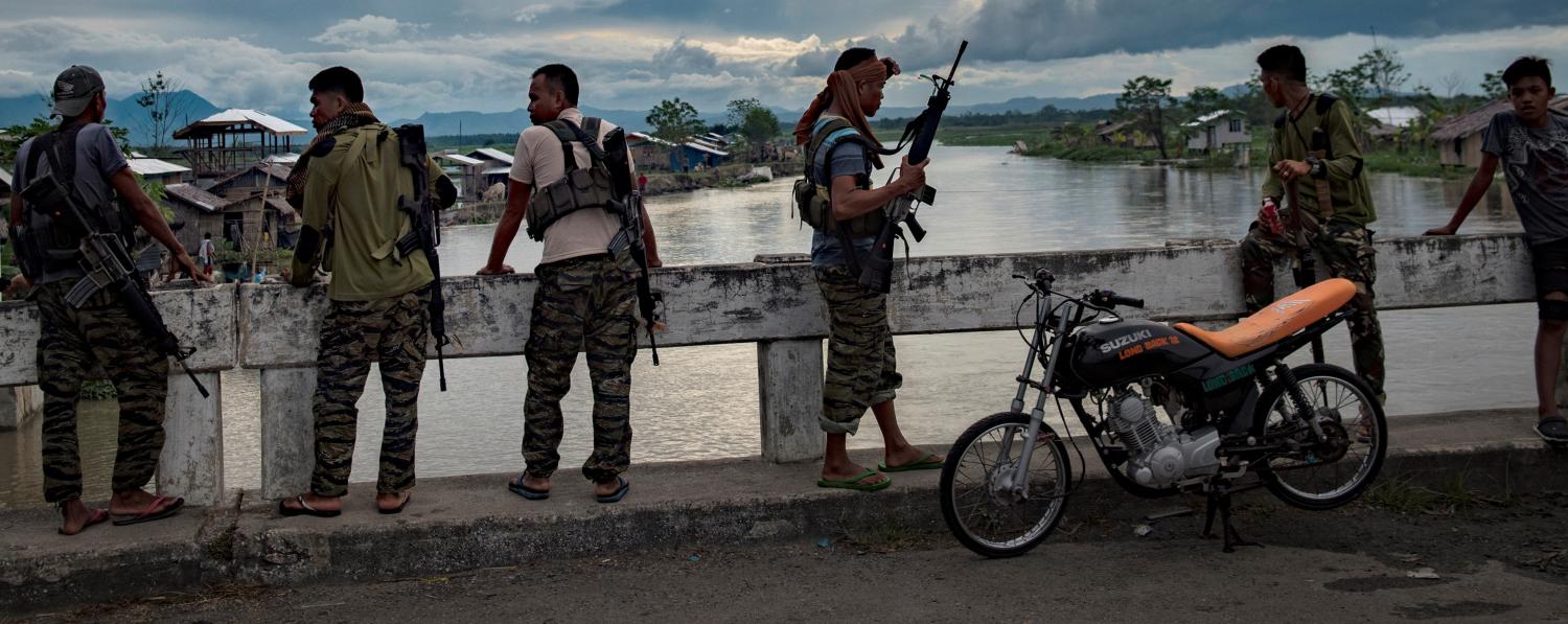  Moro Islamic Liberation Front Fighters guarding a bridge, Maguindanao Province, Mindanao, the Philippines, August 2017 (Photo: Getty Images/Jes Aznar)