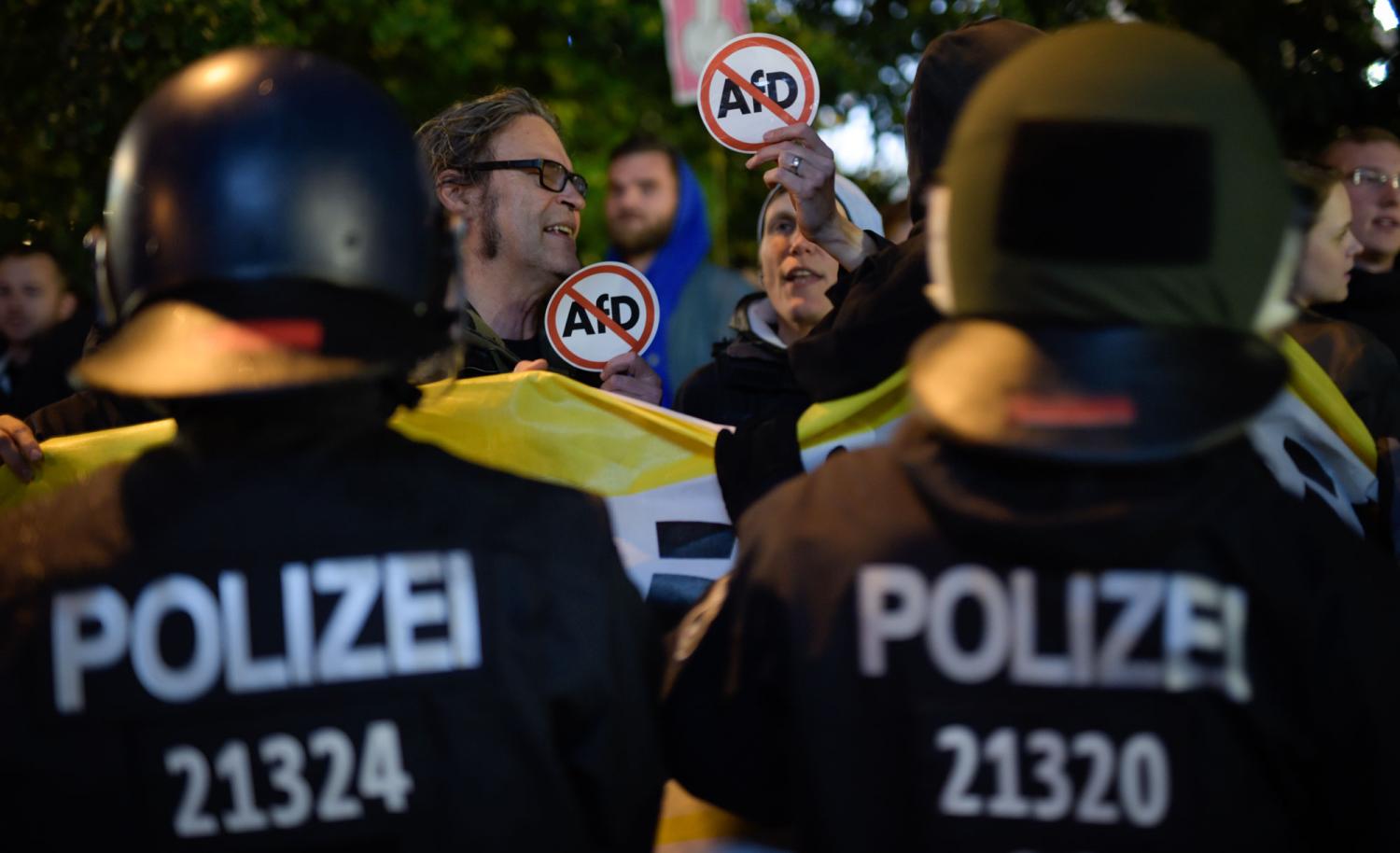 Opponents of the Alternative for Germany (AfD) protest after the German federal elections. Photo by Jens Schlueter/Getty Images