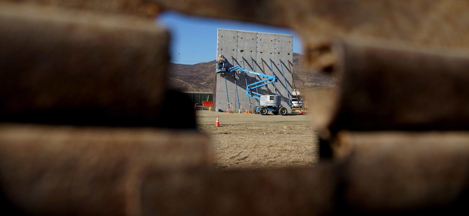 Prototypes of possible border walls between the US and Mexico under construction, October 2017 (Photo: Sandy Huffaker/Getty Images)