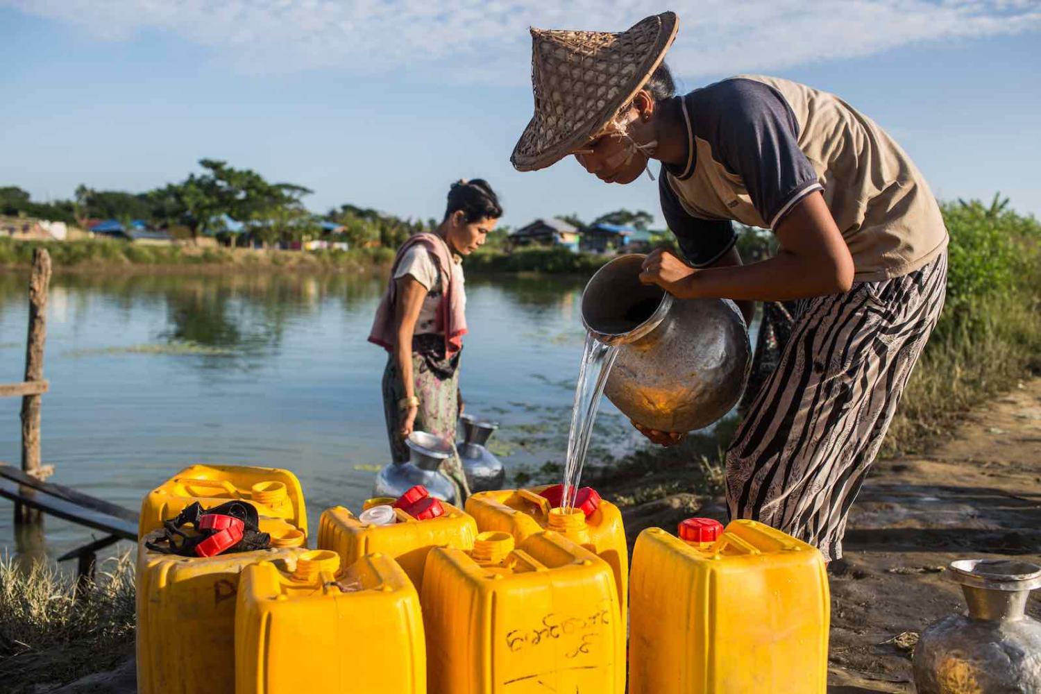 Collecting water in a camp for Rohingya Muslims displaced by the 2012 violence in Rakhine state, November 2017 in Sittwe, Myanmar (Lauren DeCicca/Getty Images)
