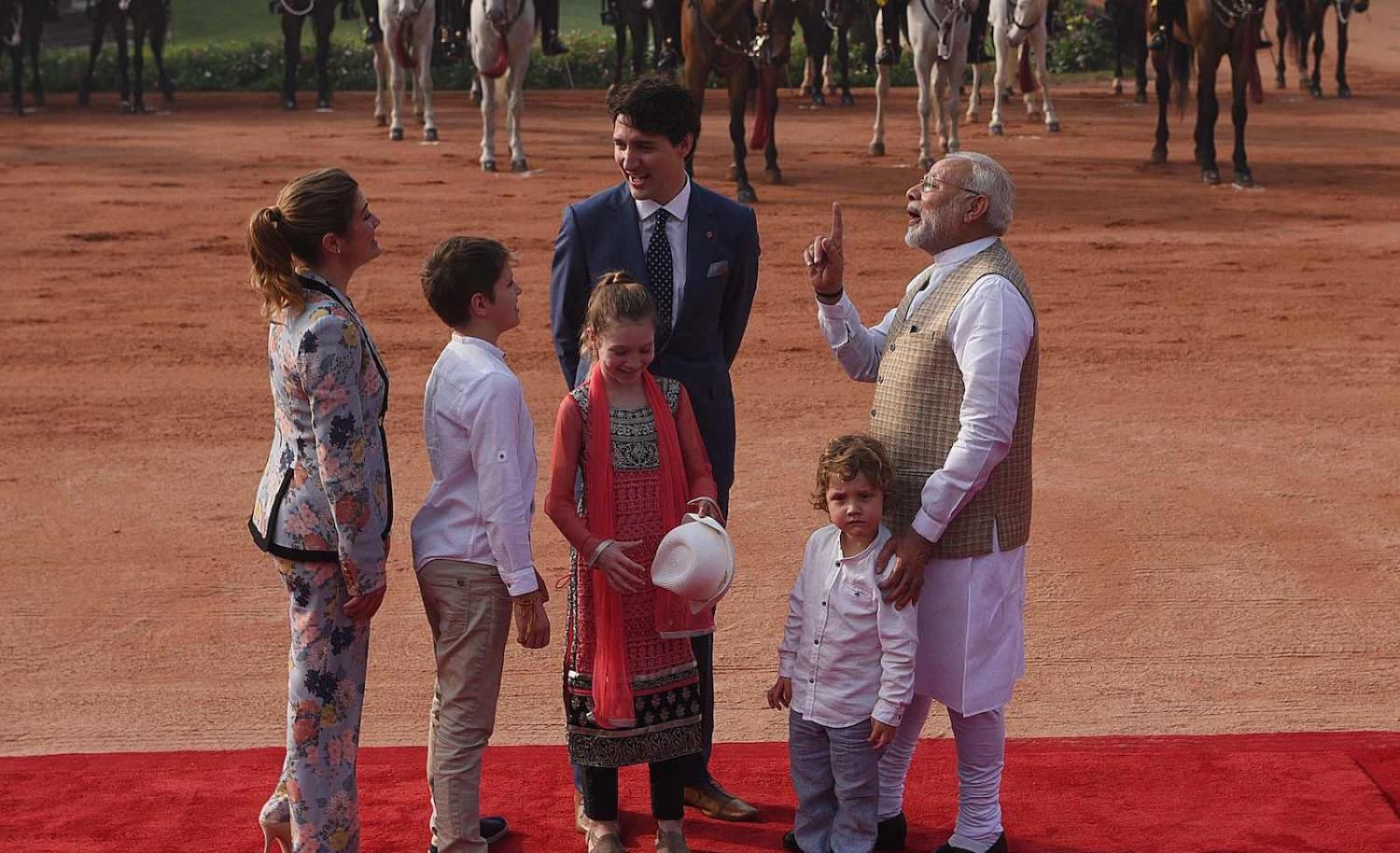Indian Prime Minister Narendra Modi (right) welcoming Canadian Prime Minister Justin Trudeau and his family in New Delhi, 23 February 2018 (Vipin Kumar/Hindustan Times via Getty Images)