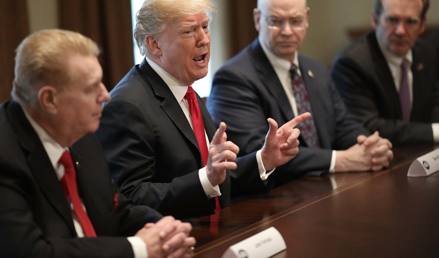Donald Trump announces planned tariffs on imported steel and aluminium in a meeting with industry chiefs (Photo: Win McNamee/Getty)