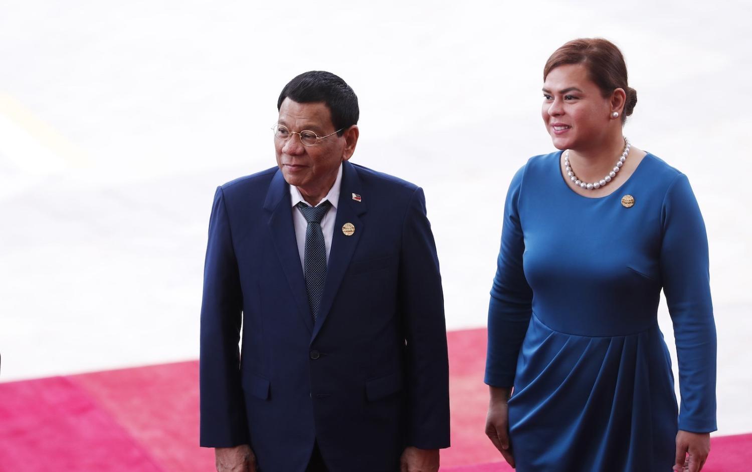 Philippines President Rodrigo Duterte (L) and daughter Sara Duterte at the Boao Forum for Asia Conference 2018, in China's Hainan province, April 2018 (AFP via Getty Images)